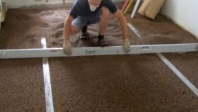 Nivellement du sol pour le stratifié