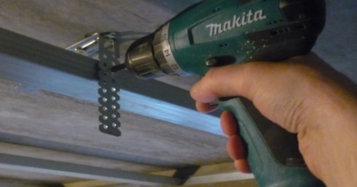 Fixation du profil au cintre