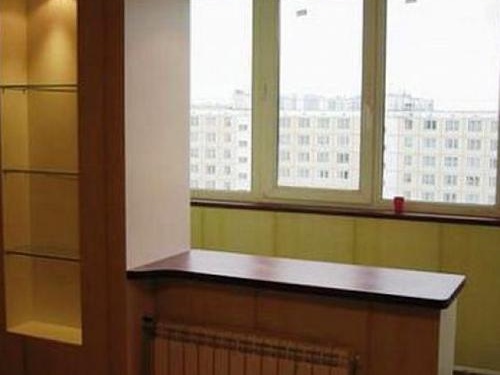 Joindre la loggia à la cuisine