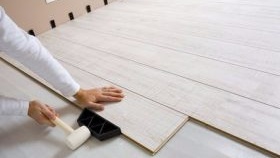 Pose de stratifié sur sol en béton