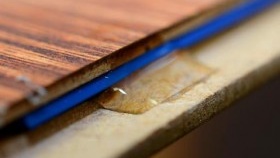 base inégale pour sol stratifié