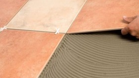 pose de nouveaux carreaux