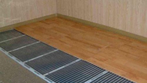 pose parquet sur plancher chauffant