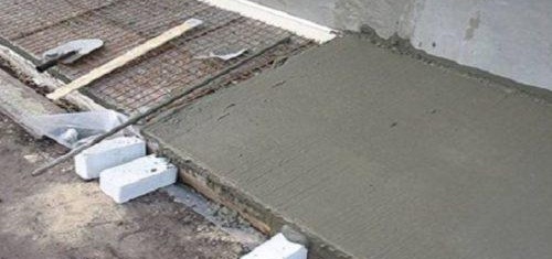 pose de carrelage sur socle béton