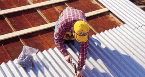 pose d'ardoises sur toiture