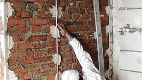 Installation de balises sur la photo murale